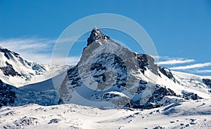 Zermatt small Matterhorn view mountain winter snow landscape Swiss Alps clouds