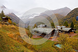 Zermatt, Switzerland-October 21, 2019:View of The Old Building on Furi cable car station in autumn and rainny day. at furi village