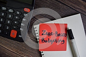 Zero-Based Budgeting write on sticky notes isolated on Wooden Table photo