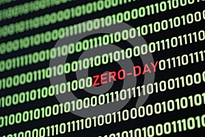 ZERO-DAY text and binary code concept from the desktop computer screen.