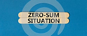 Zero-sum situation symbol. Concept words Zero-sum situation on beautiful wooden stick. Beautiful blue table blue background. photo