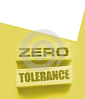 Zero tolerance - words from wooden blocks with letters, severely punishing all unacceptable behaviour, zero tolerance
