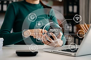 Zero trust security concept Person using computer and tablet with zero trust icon on virtual screen of Data businesses.in office