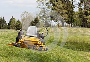 Zero turn lawn mower on turf with no driver photo