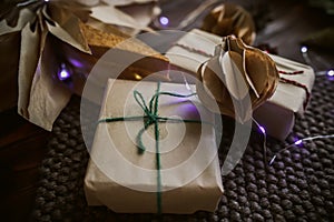 Zero waste Christmas gift. Wrapped by hand gift in New Year Eve. Delivered and balls made of craft paper. paper handmade