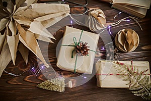 Zero waste Christmas gift. Wrapped by hand gift in New Year Eve. Delivered and balls made of craft paper. paper handmade