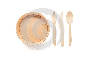 Zero waste concept. paper plate and wooden fork, spoon, knife isolated on a white background. Plastic rejection