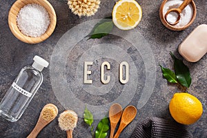 Zero waste eco friendly cleaning concept. wooden brushes, lemon, baking soda, vinegar