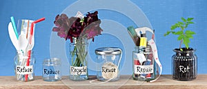 Zero Waste management, illustrated in 6 jars with text Refuse, reduce, recycle, repair, reuse, rot.