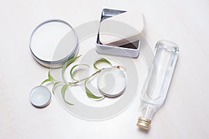 Zero waste options for your bathroom. Reusable, repurposed glass and tin cosmetics containers.