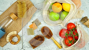 Zero-waste, plastic-free kitchen and food preparation flatlay overhead.