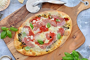 Zesty Italian pizza flat lay photo