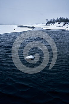 Zeya river at snow blizzard