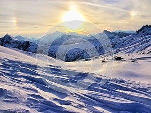 Zhao pass in the Italian Alps in winter at sunset