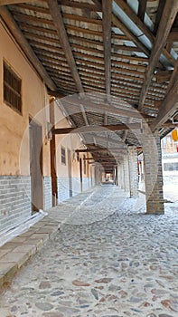 Zhouqian Shixing Old village house made of wooden tiles and A long corridor paved with stones