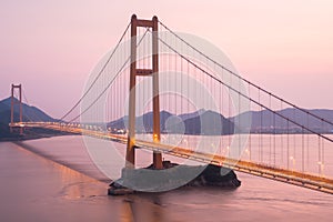 Zhoushan xihoumen bridge in sunset photo