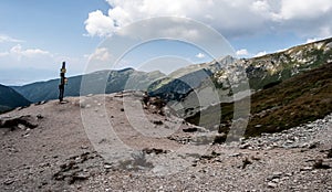 Ziarske sedlo with guidepost and peaks on the background in Western Tatras mountains in Slovakia