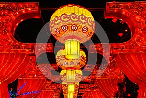 The Zigong Chinese Lantern Festival in Zigong, Sichuan, China. Colorful lanterns above a walkway.