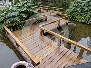 Zigzag style wooden footbridge photo