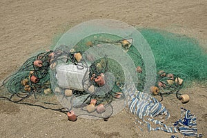 Fishing nets on Playa Larga, Zihuatanejo, Mexico photo