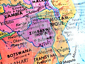 Zimbabwe Africa focus macro shot on globe map for travel blogs, social media, website banners and backgrounds.