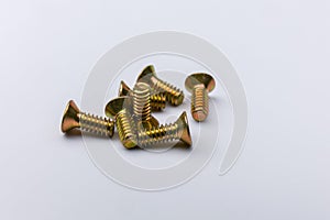 Zinc plated screws on white background