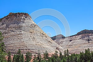 Zion National Park - Scenic view of Navajo Sandstone mountain peak Mount Carmel in Zion National Park in Washington County, Utah
