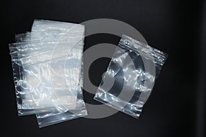 Zip lock plastic bag isolated on black background