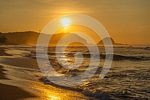 Zipolite beach at sunrise, Pacific coast of Mexico photo