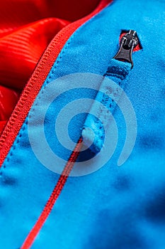 Zippered blue coat pocket