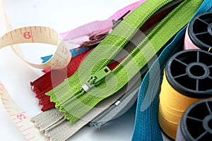 Zippers with sewing accessories