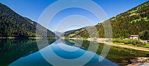 Zoccolo Lake wide landscape, Santa Valburga, Italy