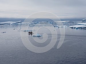 Zodiac in Antarctica iceberg landscape