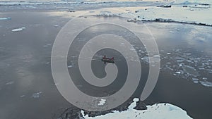 Zodiac boat sail brash ice tracking aerial view