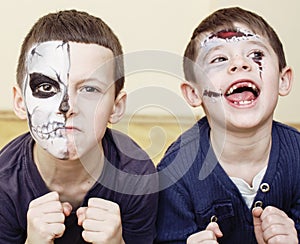 Zombie apocalypse kids concept. Birthday party celebration facepaint on children dead bride, scar face, skeleton