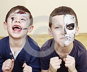Zombie apocalypse kids concept. Halloween party celebration facepaint on children dead bride, scar face, skeleton