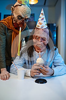 Zombie employees congratulate colleague with birthday