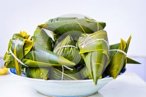 Zongzi Placed in White Plate with Light Background