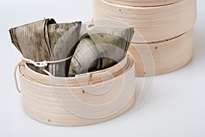 Zongzi in round bamboo crate