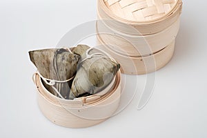 Zongzi in round bamboo crate