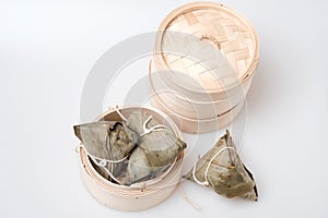 Zongzi in round bamboo crate