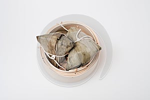 Zongzi in round bamboo crate