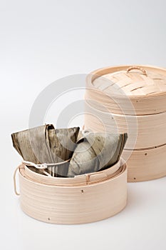 Zongzi in round bamboo crate