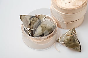 Zongzi in round bamboo crate