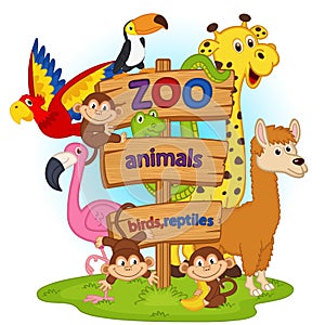 Zoo animals near wooden sign photo