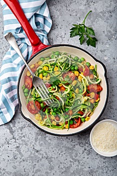 Zoodle zucchini noodle  with vegetables on pan