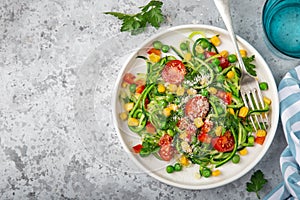 Zoodle zucchini noodle  with vegetables on white plate