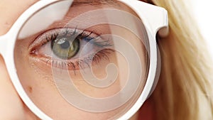 Zoom, eye and glasses with woman for vision and optometry, eyecare and wellness with health on white background. Cropped