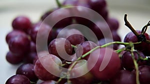 Zoom out shot of fresh red grapes