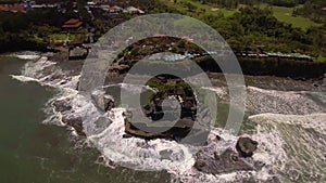 Zoom out from the Tanah Lot Temple.